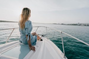 woman sat on a boat